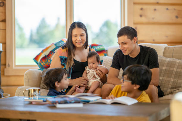 family reading on couch